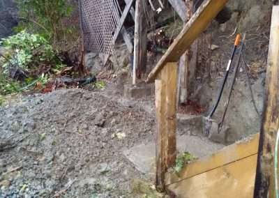 Construction work being done on the house foundation.