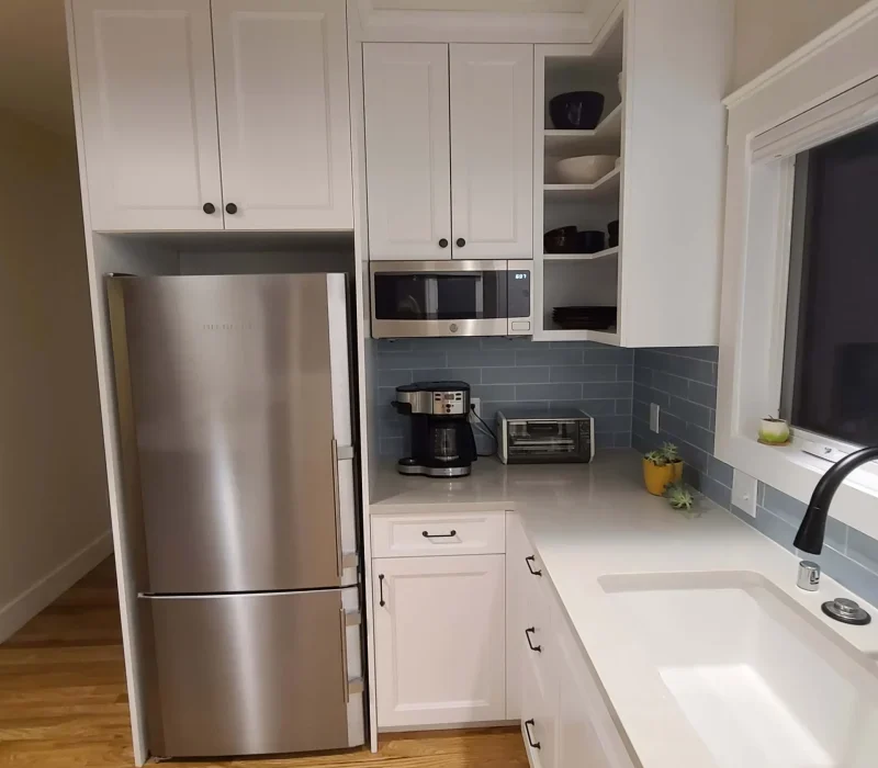 Stainless Steel Appliances and White Cabinets scaled 1 e1738857370769